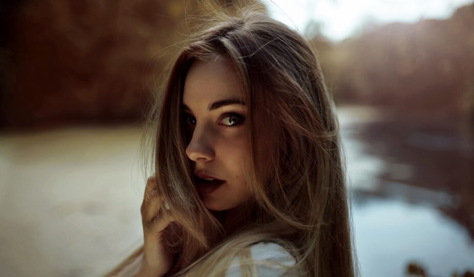 Soft natural makeup look with glowing skin and subtle eye makeup