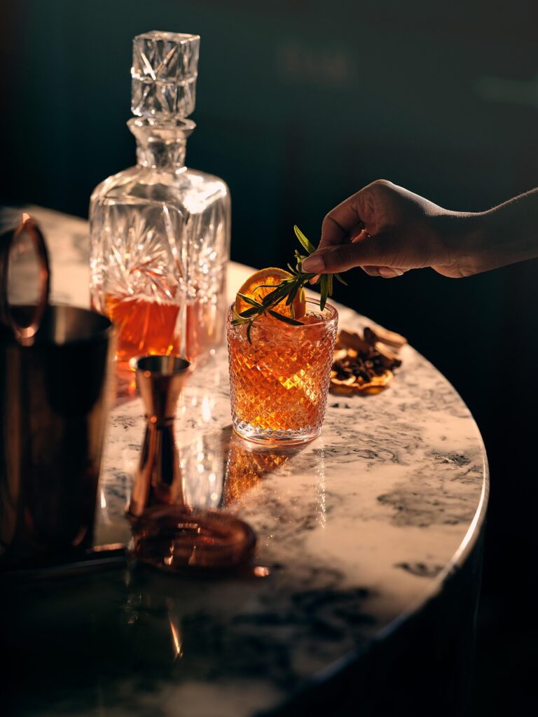 Jameson orange old fashioned whiskey cocktail with orange peel
