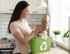 Person organising reusable items for a zero waste lifestyle at home