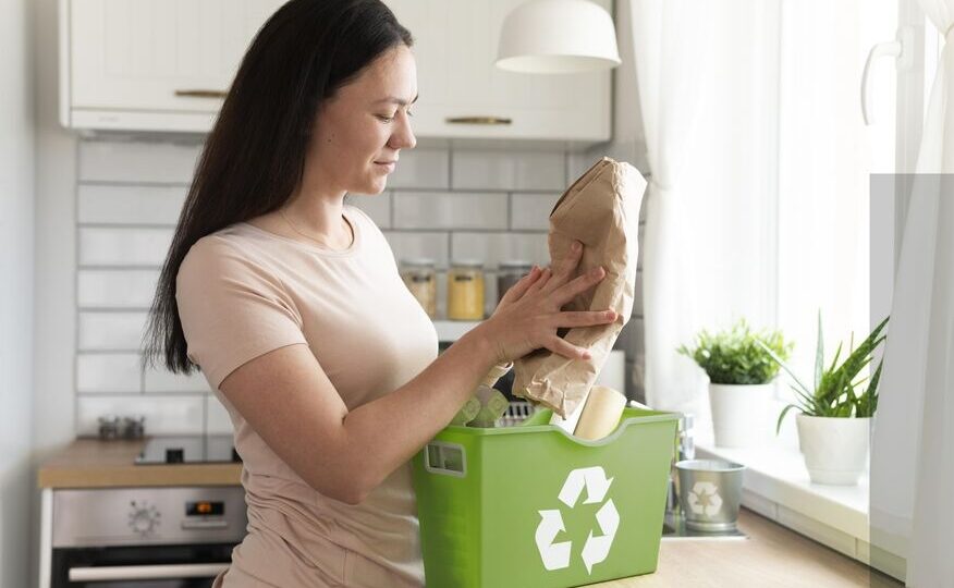 Person organising reusable items for a zero waste lifestyle at home